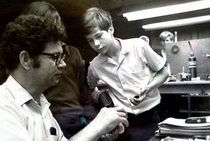Scott explains an instrument repair to young students (Interlochen Music Camp - 1981)