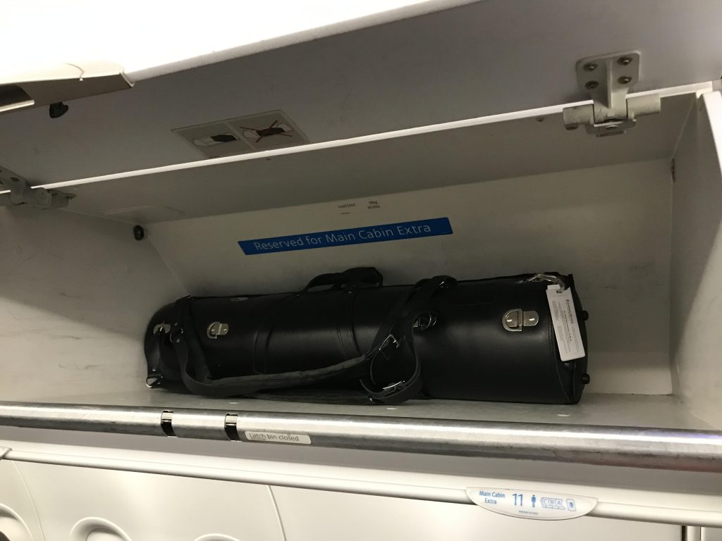Wiseman Model A bass clarinet case in the overhead bin of the Airbus A321 airplane (American Airlines)